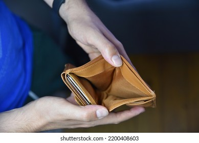 An Open Empty Purse Without Money In It