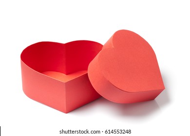 Open empty red gift box with a heart shape isolated on white background.