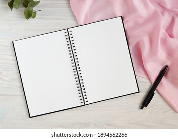 Open Empty Spiral Notebook, Planner, Sketch Book For Template, Art, Text, Lettering, Mockup, Feminine Styled Stock Photo.