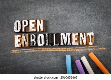 Open Enrollment. Word On A Dark Chalk Board.