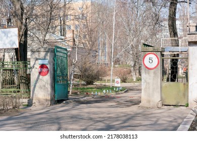 Open Entrance To The Old Government Building With A Stop And 5 Km Per Hour Speed Limit Sign. Fence. Control. Security. Gate. Transport. Entry. Secure. Security. Limit. Restriction. Metal. Obsolete 