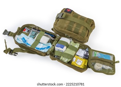 Open equipped military individual first aid kit with a content in the textile pouch and the same closed kit on a white background - Shutterstock ID 2225210781