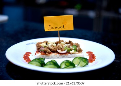 Open Face Chicken Sandwich With Cucumber Garnish