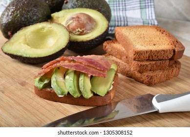 Open Faced Avocado And Bacon Sandwich On Gluten Free Toast