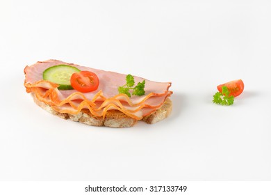 Open Faced Ham Sandwich On White Background