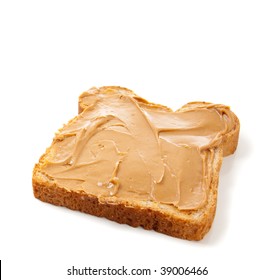 An Open Faced Peanut Butter Sandwich On White Bread