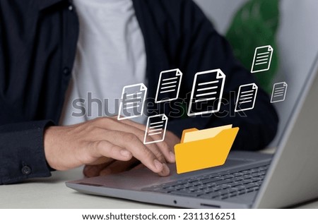  Open File folder with flying blank documents with laptop computer. Uploading documents from folder. Data transfer backup, File Sharing, Document Transferring concept.