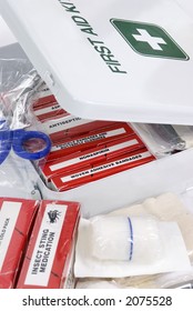 An Open First Aid Kit With The Contents In View