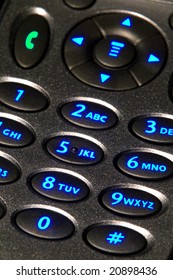 Open Flip Cell Phone With Backlit Key Pad With Glowing Blue Number Keys