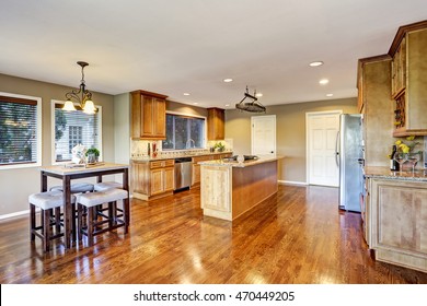 Open Floor Plan. Kitchen Room Interior With Island And Granite Counter Top. Northwest, USA