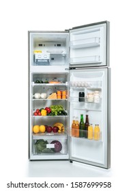 Open Fridge And Freezer With Fresh Food On Shelves Isolated On White