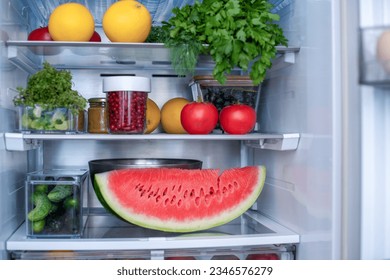 Open fridge full of fresh fruits and vegetables, vegetarian food healthy food background, greenery, organic nutrition, health care, dieting concept.	 - Powered by Shutterstock