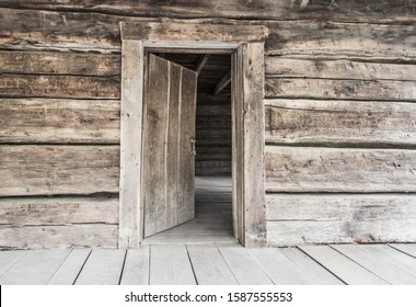 Open Front Door. Rustic abandoned log cabin with open front door in the Great Smoky Mountains. - Powered by Shutterstock