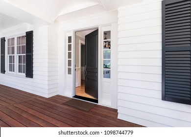 Open Front Door To Traditional Home. Lake Oswego, Oregon
