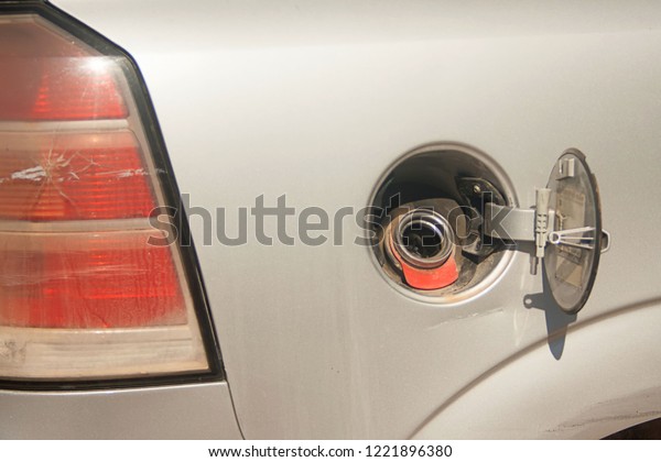 open fuel tank in the\
car