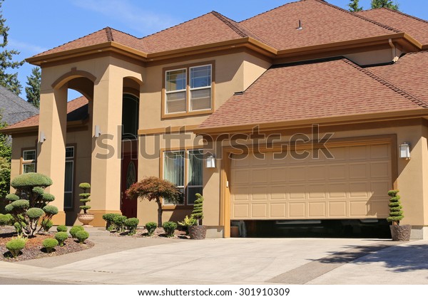 Open garage door in\
suburban family home