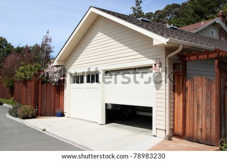 Open garage door in suburban house