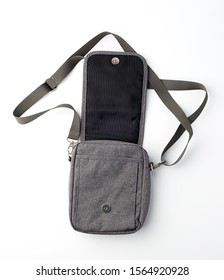 Open Gray Textile Men's Bag With A Long Strap On A White Background, Top View