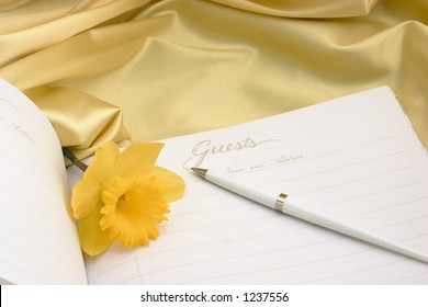 Open Guest Book (text Area) With Yellow Daffodils On Yellow Satin