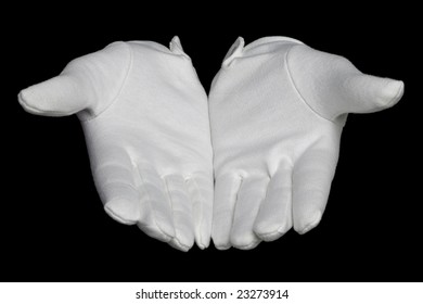 Open hands palms up in white gloves, isolated on a black background.