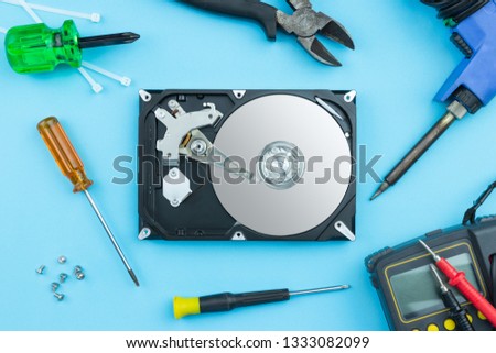 Open hard disc drive, Hard disc and tools.