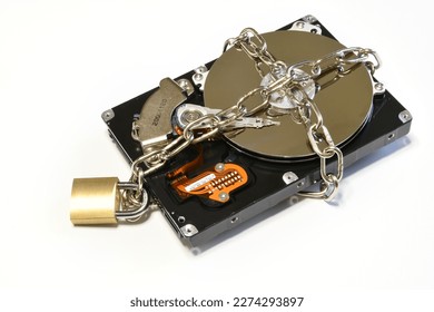 Open hard drive secured with an iron chain and padlock. Cyber ​​security concept. Data of hard drive secured by padlock - Powered by Shutterstock