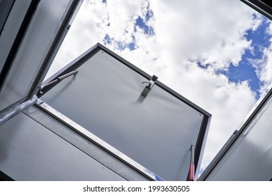 Open Hatch For Roof Access Cloudy Sky On Background