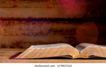 Open Bible Black Background Foto Stok 1255757458 | Shutterstock