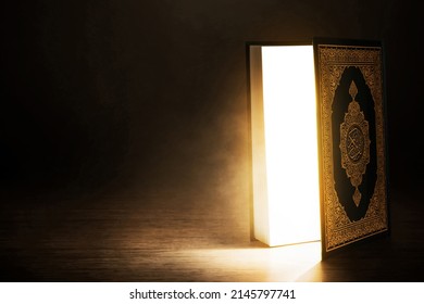 Open holy book on dark background - Powered by Shutterstock