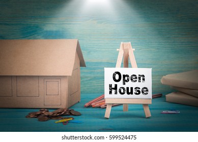 Open House. home model, money and a notice board under the sunlit