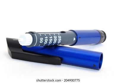 Open Insulin Blue Pen On A White Background