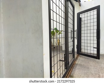 An Open Iron Shop Door