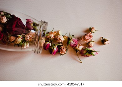 open the jar of dried roses lying on white background - Powered by Shutterstock