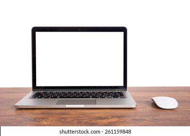 Open laptop with isolated white screen on old wooden desk.