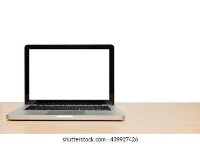 Open Laptop With Isolated White Screen On Wooden Desk