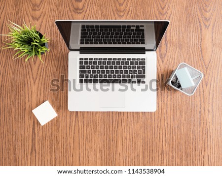 Similar – Desktop office mix on a wooden table