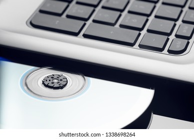 Open Laser Disk Drive Laptop. Focus On A Laser Disk.