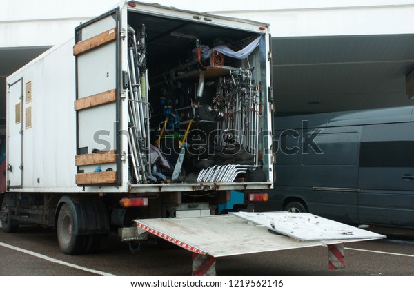 open lorry with cinema\
equipmetn