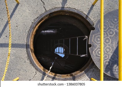 Open manhole on a city street
