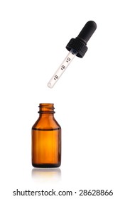 Open Medicine Bottle With A Dropper Hanging Over