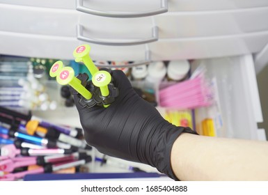 Open Medicine Cabinet In A Medical Clinic.Vaccine Against The Virus. The Cure For The Disease. Search For The Necessary Medicines In The Medical Cabinet