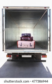 Open Metal Container Of  Truck With Suitcases Inside