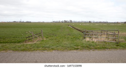 Open Metal Farm Gate In The Dutch Landscape