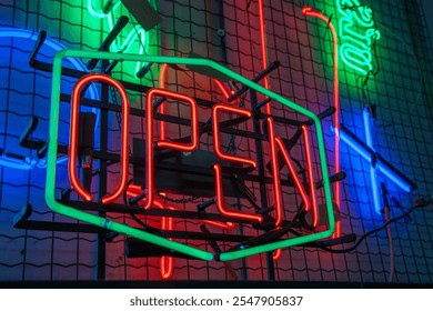 OPEN neon sign in a neon glassblowing workshop - Powered by Shutterstock