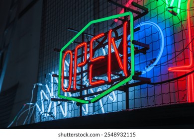 OPEN neon sign in a neon glassblowing workshop - Powered by Shutterstock