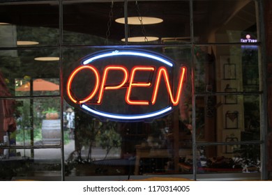 Open Neon Sign In A Window