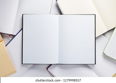 open notebook or book with empty pages, top view - Shutterstock ID 1179998557