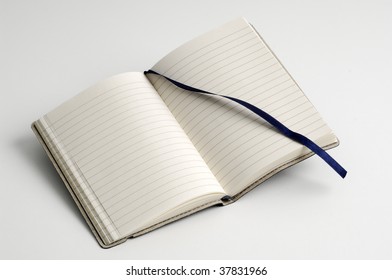 Open notebook isolated on white
