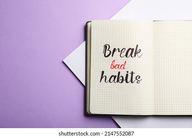 Open Notebook With Phrase Break Bad Habits On Violet Background, Top View. Space For Text