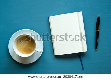 open notebook, space for text, lined cards, rectangle, coffee cup, turquoise background, canvas texture, photo taken from above